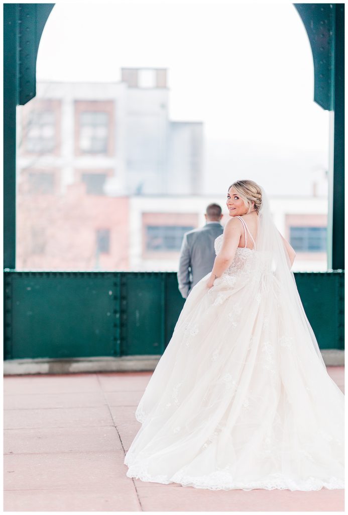First look on a rainy wedding day