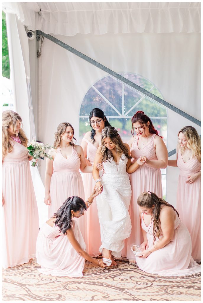 Bride getting ready with bridesmaids 