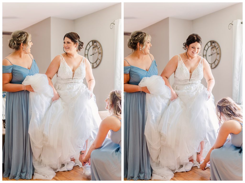 bridesmaids helping with shoes 